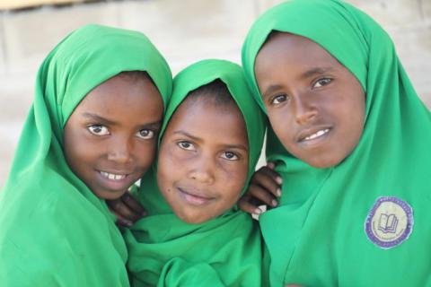 Nemo (left) with her friends Sumeya (middle) and Fatuma (right) at Barkhadle primary school. 