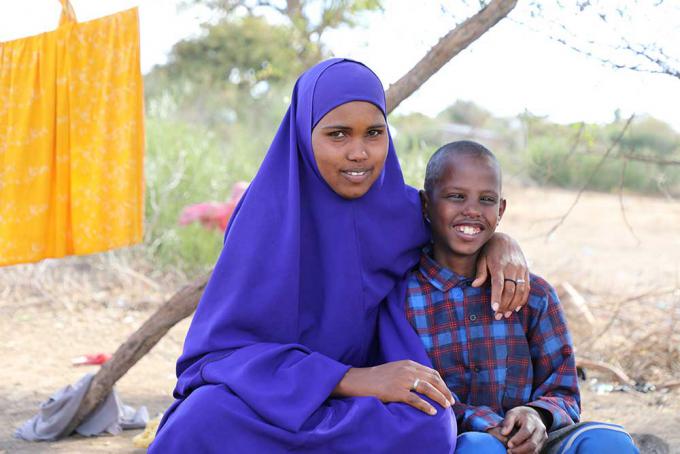 Ali with his stepmother Ferhiya at their home in Chamuk IDP site 