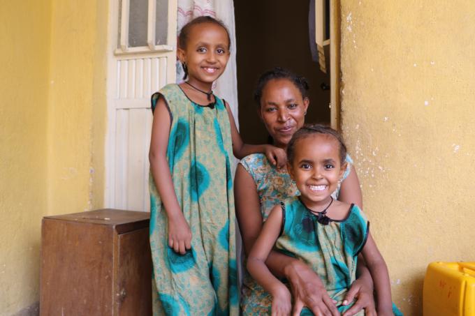 Almaz with her daughters Rahel (left) and Hirut (right) at their home in Dire Dawa  