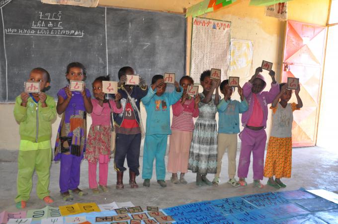 Students learning Amharic alphabets at Shafat Primary School 