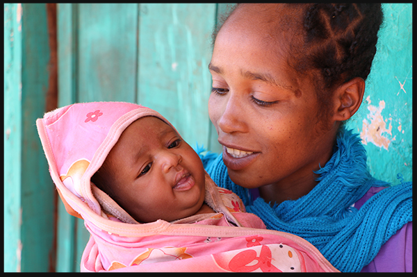 Asnakech, holding her baby girl - Tibibir